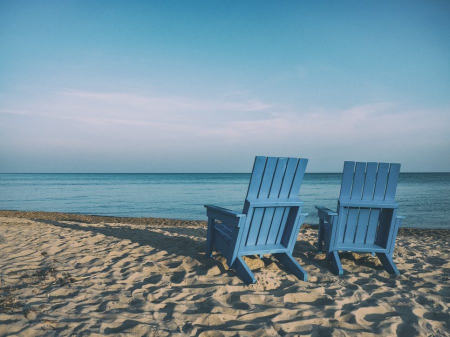 retirement planning, two chairs on a beach