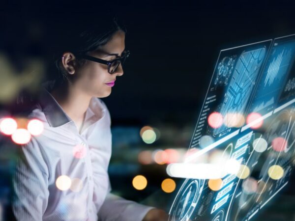 Woman investigating ai technology on a clear computer screen