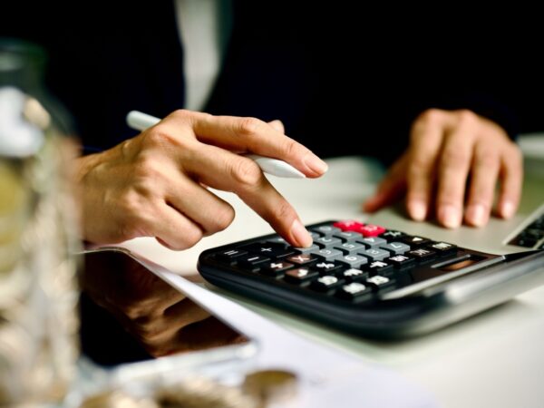 A person using a calculator.