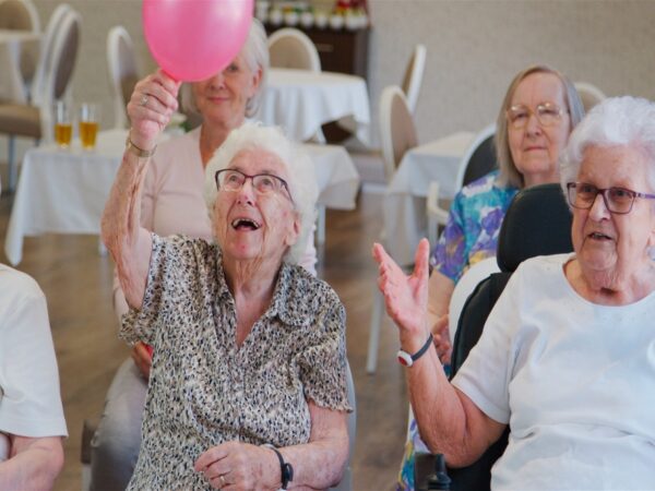 A group of seniors in a retirement home.