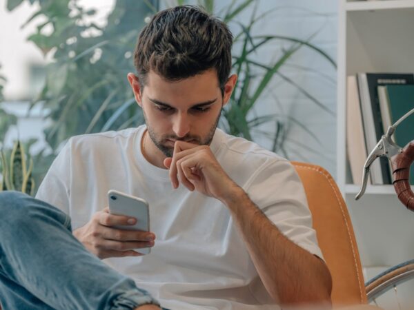A man using his phone.