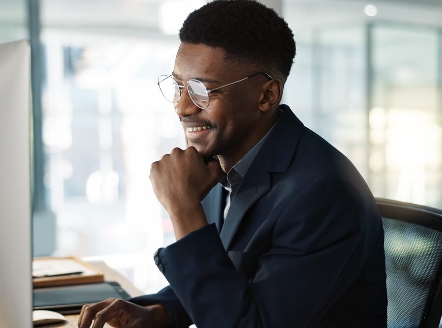 A man working at a computer.