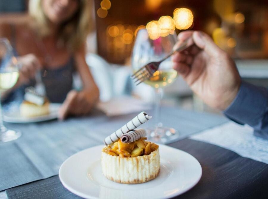 A couple enjoying a meal in a restaurant.